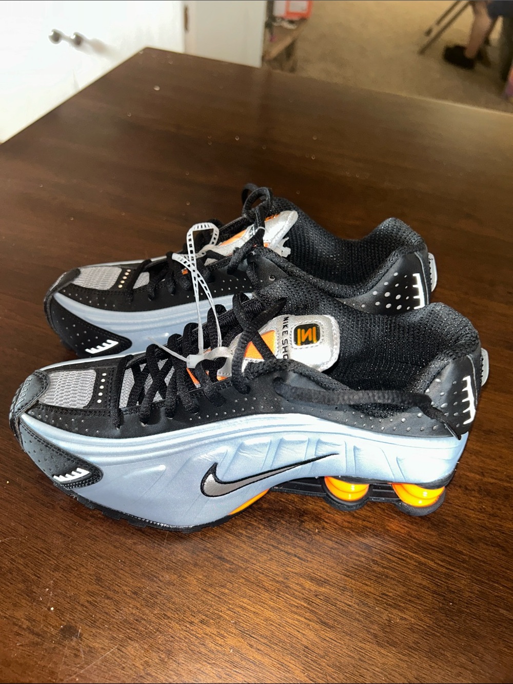 Nike Black and Gray Sneakers with Orange Accents